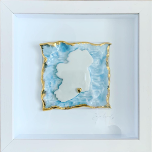 Give the gift of home with this delicately handmade heirloom porcelain piece. Uisce na hEireann is a high fired porcelain map of Ireland with a heart (or hearts) placed in any location of your choice set on cornflour blue seas with a 9ct gold edging. 